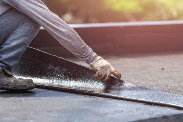 Professional Waterproofing technician working in Petersburg, MI